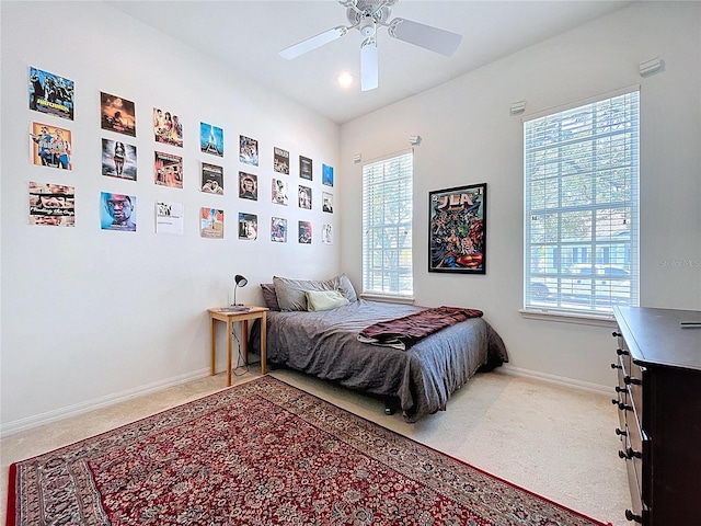 10309 Marchmont Ct, Tampa, FL 33626 - bedroom featuring carpet floors, baseboards, and a ceiling fan