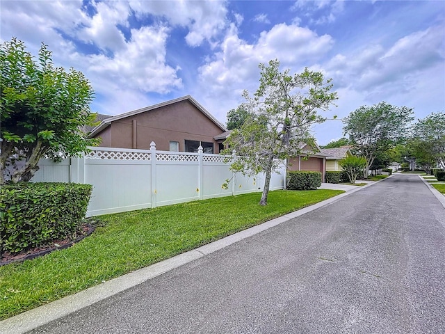 10309 Marchmont Ct, Tampa, FL 33626 - view of home's exterior with stucco siding