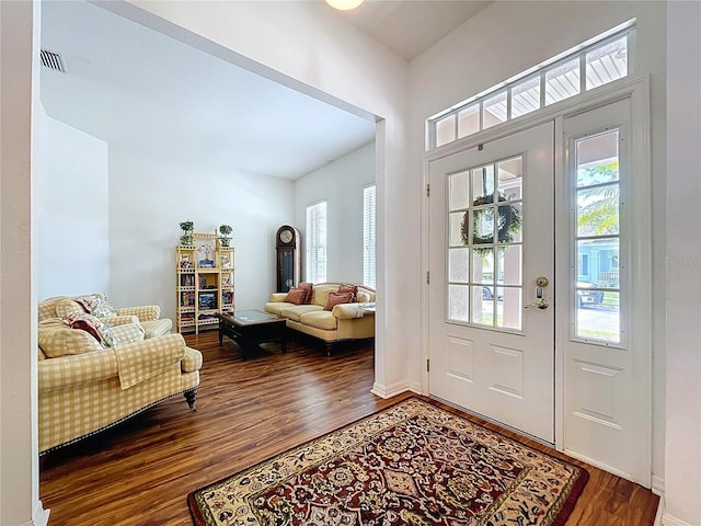 10309 Marchmont Ct, Tampa, FL 33626 - entrance foyer featuring healthy amount of natural light, wood finished floors, and baseboards