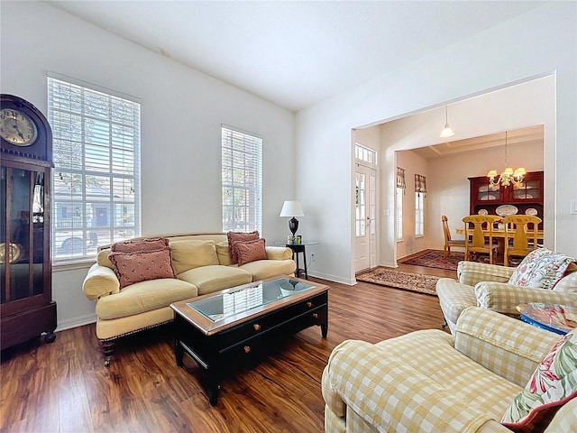 10309 Marchmont Ct, Tampa, FL 33626 - living area featuring a chandelier, wood finished floors, and baseboards