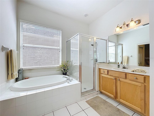 10309 Marchmont Ct, Tampa, FL 33626 - full bathroom featuring vanity, a bath, a shower stall, and tile patterned flooring
