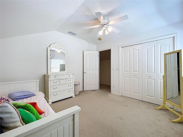 10309 Marchmont Ct, Tampa, FL 33626 - bedroom with vaulted ceiling, light colored carpet, a closet, and ceiling fan