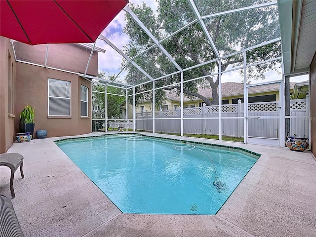 10309 Marchmont Ct, Tampa, FL 33626 - view of swimming pool featuring a patio area and glass enclosure