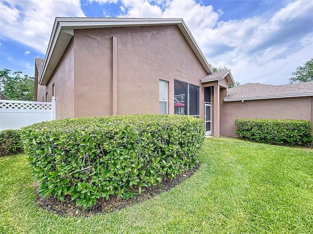 10309 Marchmont Ct, Tampa, FL 33626 - view of property exterior featuring stucco siding