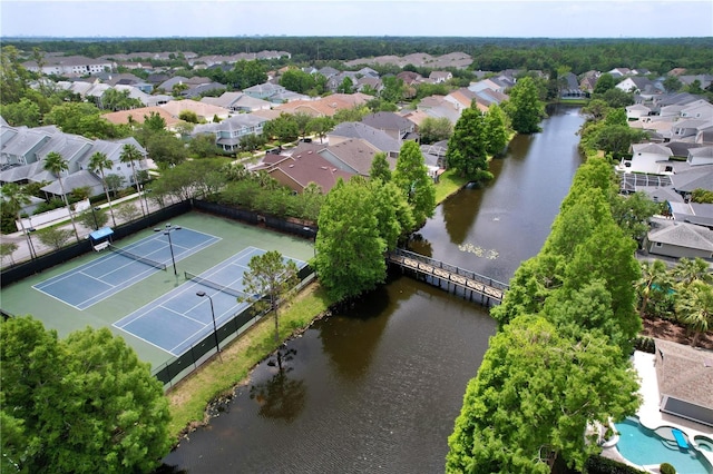 10309 Marchmont Ct, Tampa, FL 33626 - aerial perspective of suburban area with a large body of water