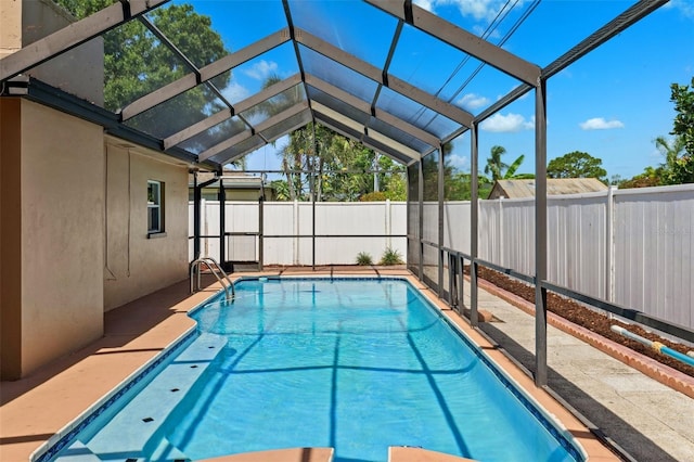 6365 32nd Ave N, Saint Petersburg, FL 33710 - view of swimming pool featuring a fenced backyard, a lanai, and a patio area