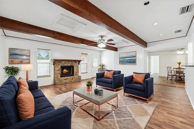 6365 32nd Ave N, Saint Petersburg, FL 33710 - living area with ceiling fan, beamed ceiling, wood finished floors, healthy amount of natural light, and recessed lighting