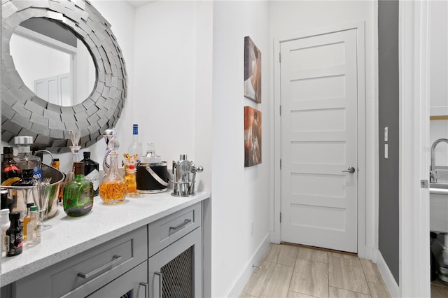 bar featuring baseboards