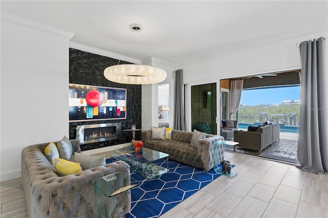living area featuring crown molding and a high end fireplace