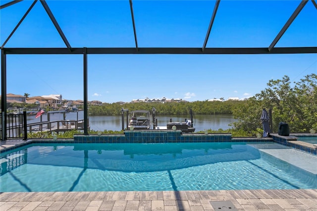 view of pool with a boat dock, boat lift, a water view, and glass enclosure