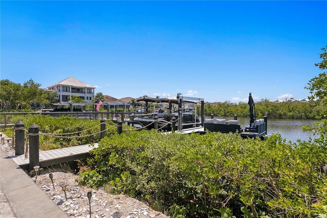 dock area featuring a water view