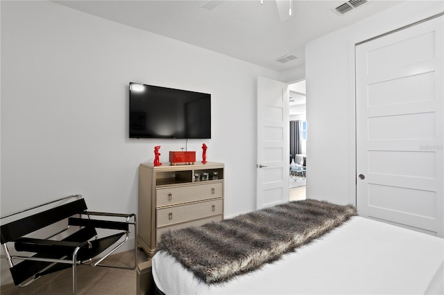 carpeted bedroom with visible vents