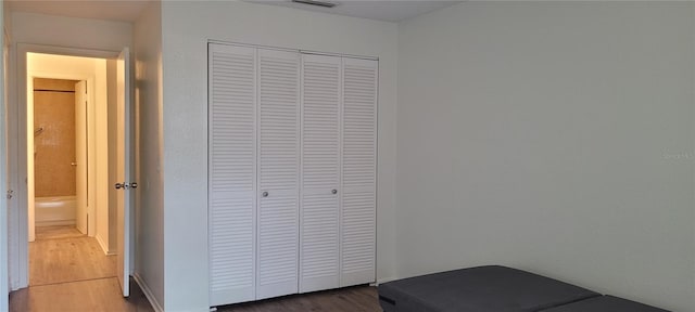 200 Country Club Dr Unit 906, Largo, FL 33771 - bedroom with a closet and wood finished floors