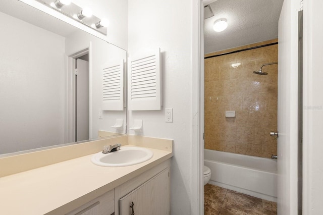 200 Country Club Dr Unit 906, Largo, FL 33771 - full bath featuring vanity, tile patterned floors, toilet, and shower / washtub combination