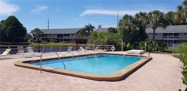 200 Country Club Dr Unit 906, Largo, FL 33771 - pool with fence and a patio