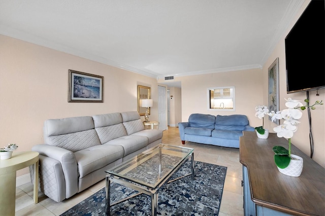 living room with baseboards, visible vents, and ornamental molding