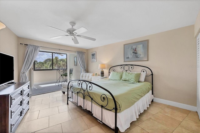 bedroom with access to outside, a ceiling fan, light tile patterned floors, and baseboards