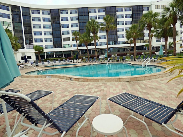 pool with a patio