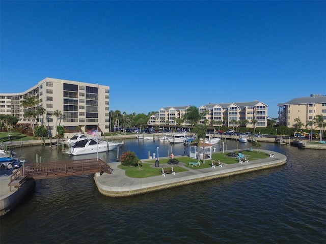 property view of water featuring a boat dock