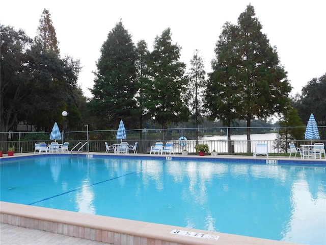community pool with fence