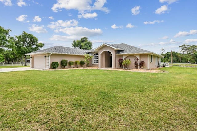 6080 Taneytown St, North Port, FL 34291 - view of front of home with a garage, concrete driveway, and stucco siding