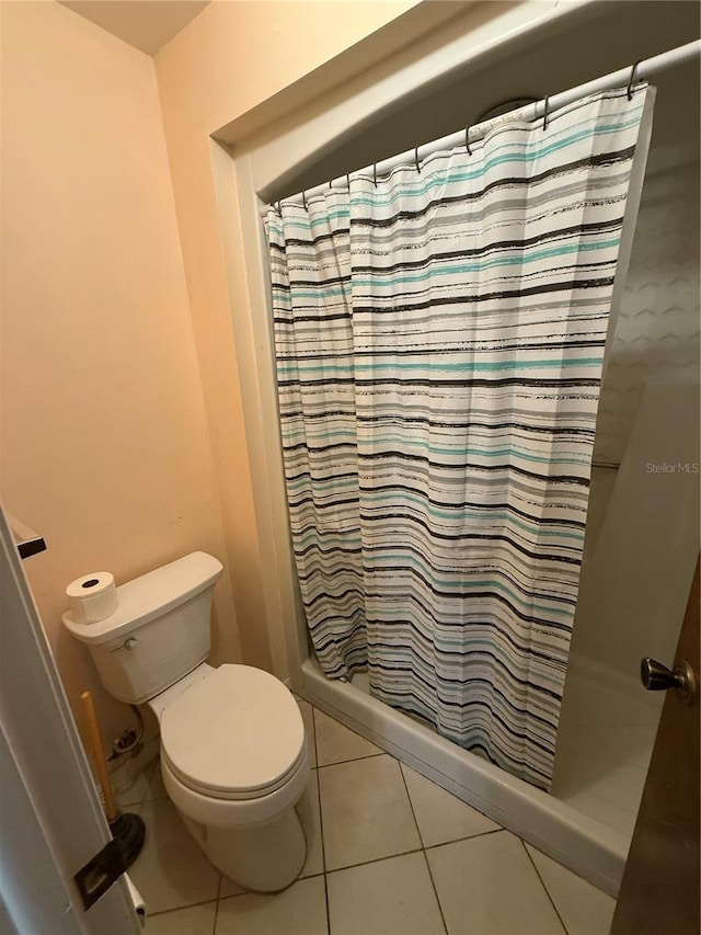 7360 Ulmerton Rd Unit 20F, Largo, FL 33771 - full bath with toilet, a shower with curtain, and tile patterned flooring