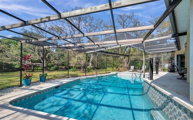 6514 Sunhigh Dr, New Port Richey, FL 34655 - swimming pool featuring a patio and glass enclosure