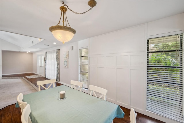 6514 Sunhigh Dr, New Port Richey, FL 34655 - dining space featuring dark wood-type flooring and baseboards