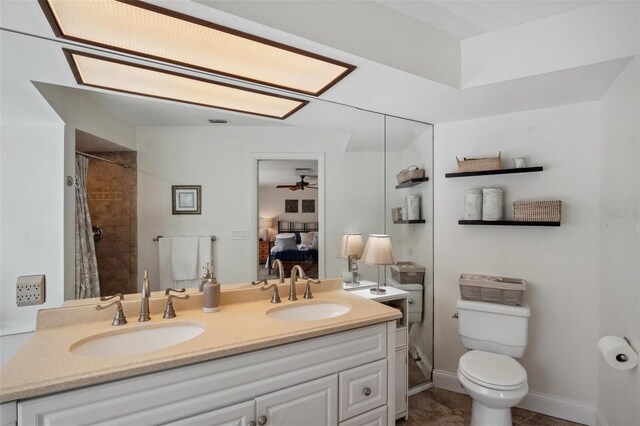 6514 Sunhigh Dr, New Port Richey, FL 34655 - ensuite bathroom with toilet, ceiling fan, double vanity, curtained shower, and tile patterned flooring