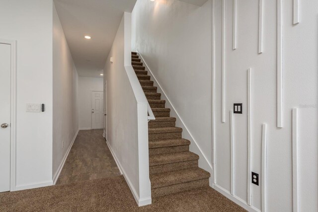 stairway with carpet flooring, recessed lighting, and baseboards