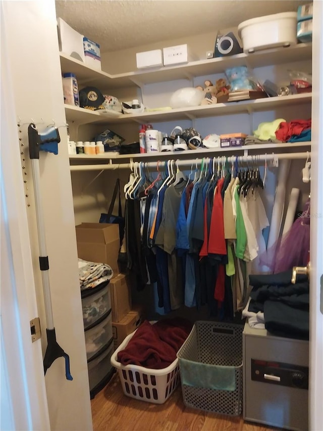 8313 Cavalry Dr, Hudson, FL 34667 - spacious closet featuring wood finished floors