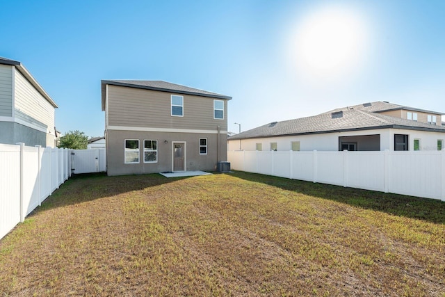 back of house with cooling unit and a patio area