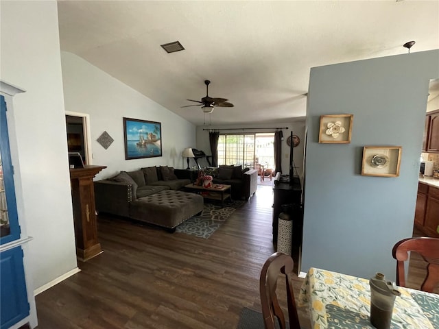 living room with vaulted ceiling, baseboards, a ceiling fan, and dark wood finished floors