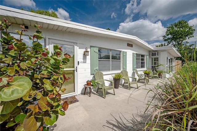 rear view of property with a patio area