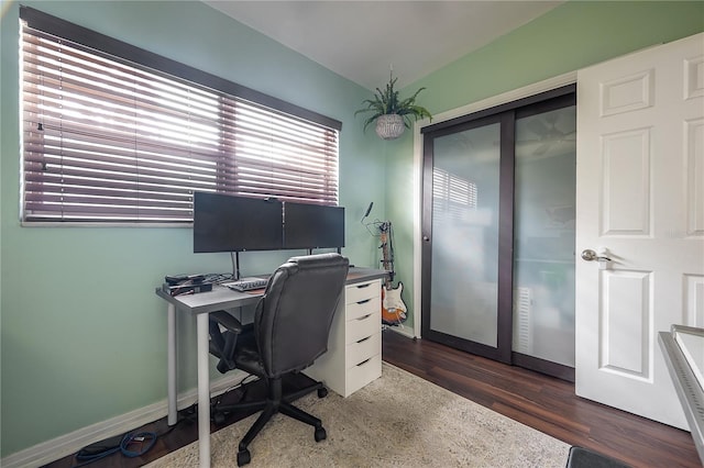 office featuring baseboards and wood finished floors