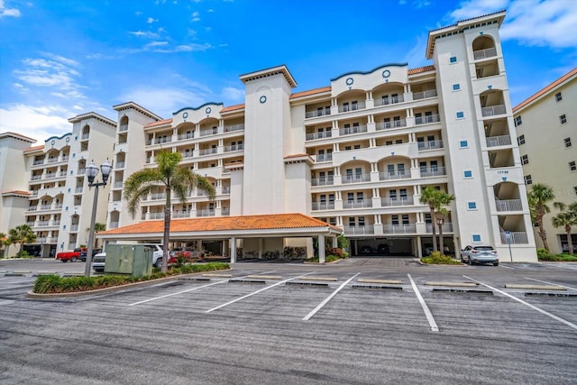 17735 Gulf Blvd Unit 304, Redington Shores, FL 33708 - view of apartment building / complex with uncovered parking