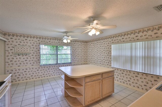 1915 W Del Webb Blvd, Sun City Center, FL 33573 - kitchen featuring wallpapered walls, open shelves, light tile patterned flooring, light countertops, and ceiling fan