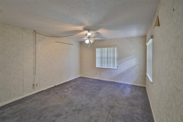 1915 W Del Webb Blvd, Sun City Center, FL 33573 - empty room featuring ceiling fan, a textured ceiling, and dark colored carpet