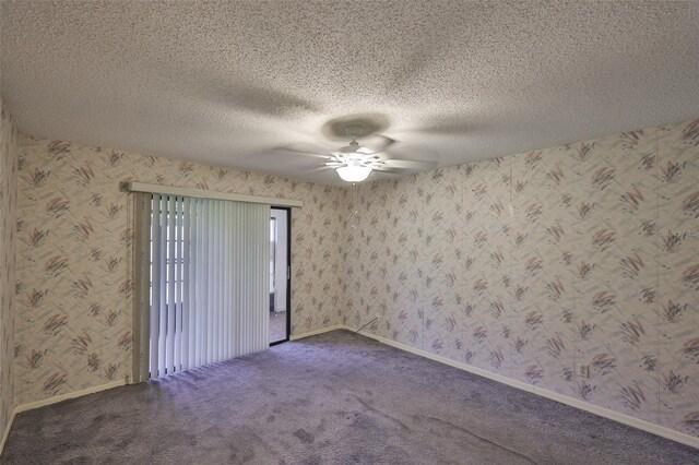 1915 W Del Webb Blvd, Sun City Center, FL 33573 - unfurnished room featuring ceiling fan, carpet floors, a textured ceiling, wallpapered walls, and baseboards