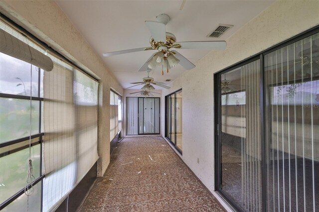1915 W Del Webb Blvd, Sun City Center, FL 33573 - unfurnished sunroom featuring ceiling fan