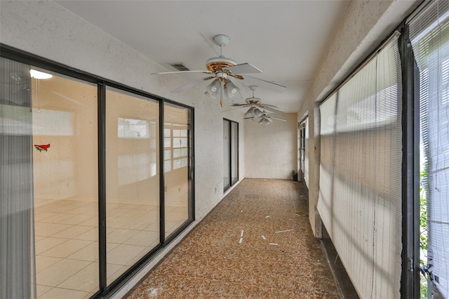 1915 W Del Webb Blvd, Sun City Center, FL 33573 - unfurnished sunroom with plenty of natural light and ceiling fan