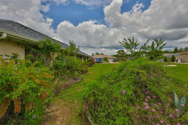 1915 W Del Webb Blvd, Sun City Center, FL 33573 - view of grassy yard