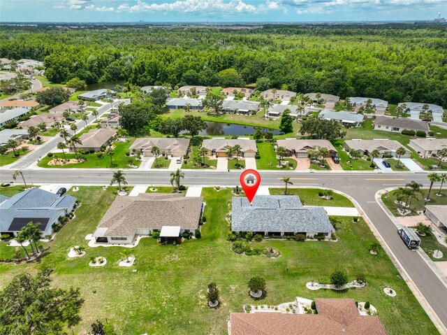 1915 W Del Webb Blvd, Sun City Center, FL 33573 - view of property location featuring a forest and nearby suburban area