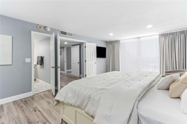 1390 Gulf Blvd Unit Ph-5, Clearwater, FL 33767 - bedroom featuring light wood-style floors, baseboards, and recessed lighting
