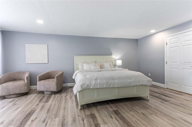 1390 Gulf Blvd Unit Ph-5, Clearwater, FL 33767 - bedroom featuring wood finished floors, recessed lighting, and baseboards
