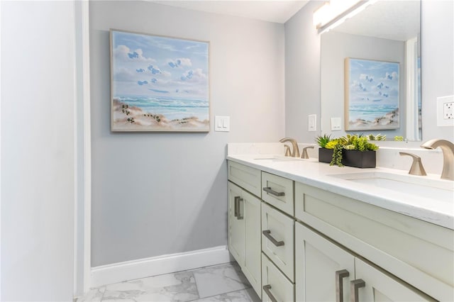 1390 Gulf Blvd Unit Ph-5, Clearwater, FL 33767 - bathroom with marble look tiles, double vanity, and baseboards