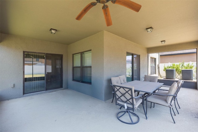 view of patio / terrace with outdoor dining area and a ceiling fan