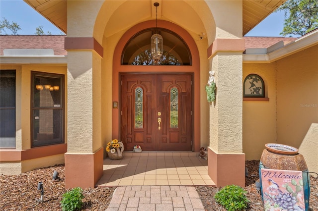 7353 Dogwood Cres, Spring Hill, FL 34607 - entrance to property featuring stucco siding