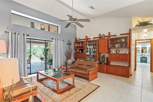 7353 Dogwood Cres, Spring Hill, FL 34607 - living area featuring high vaulted ceiling, a ceiling fan, and light tile patterned floors