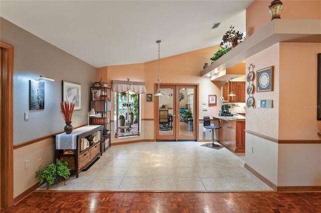 7353 Dogwood Cres, Spring Hill, FL 34607 - entrance foyer featuring vaulted ceiling and baseboards